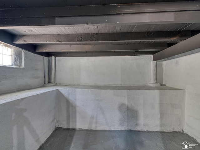 basement featuring wood ceiling