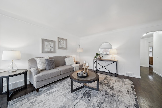 living room featuring dark hardwood / wood-style flooring