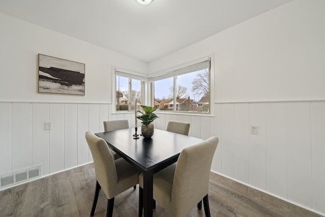 dining area featuring dark hardwood / wood-style flooring