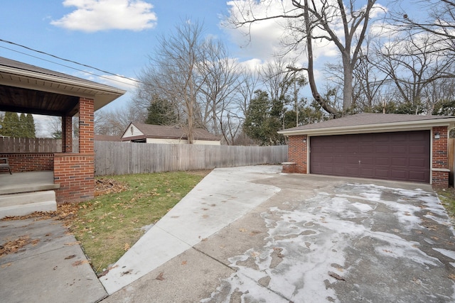 exterior space featuring a garage and an outdoor structure