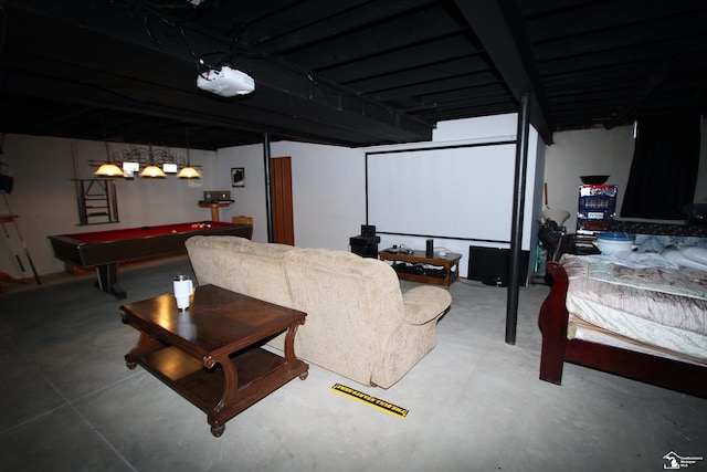 home theater featuring billiards and concrete flooring