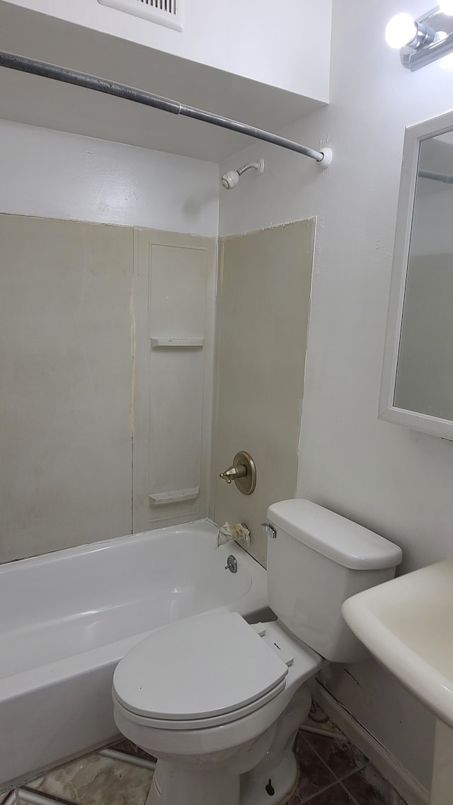 full bathroom featuring sink, toilet, and bathing tub / shower combination