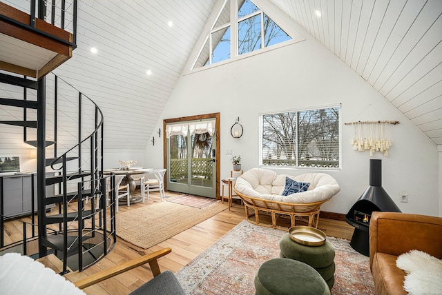 living room with wood-type flooring and vaulted ceiling