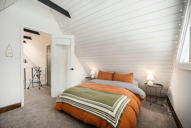 bedroom featuring lofted ceiling, carpet flooring, and wood walls