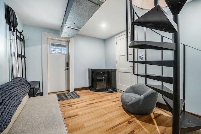 living area featuring hardwood / wood-style floors