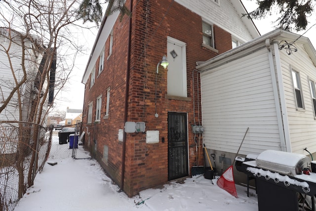 view of snow covered property