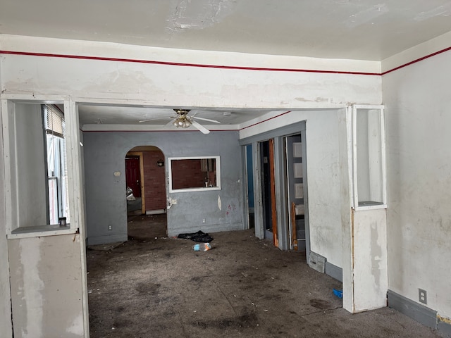 unfurnished room featuring ceiling fan