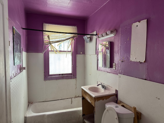 full bathroom featuring shower / tub combination, vanity, and toilet