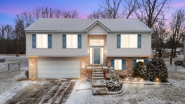 bi-level home with a garage