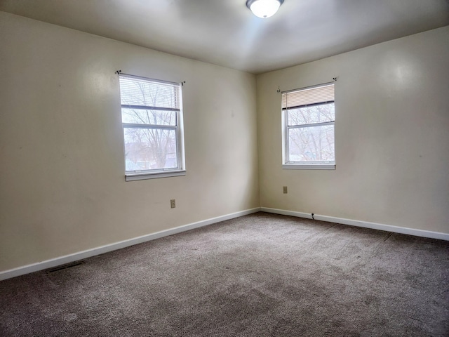 view of carpeted spare room