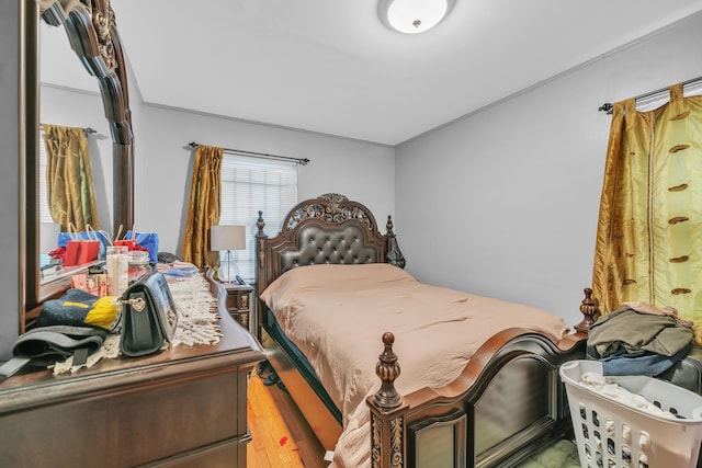 bedroom with light hardwood / wood-style flooring