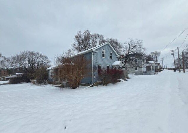 view of snow covered property