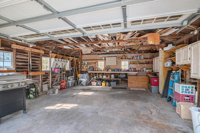 garage featuring a workshop area