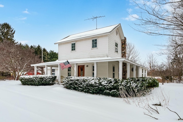 farmhouse-style home with covered porch