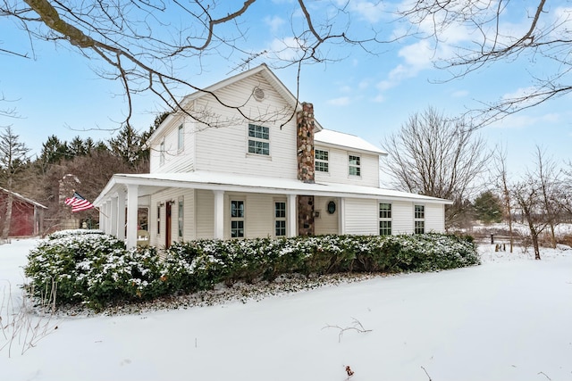 view of front of property featuring covered porch