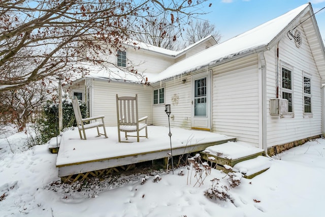 view of snow covered property