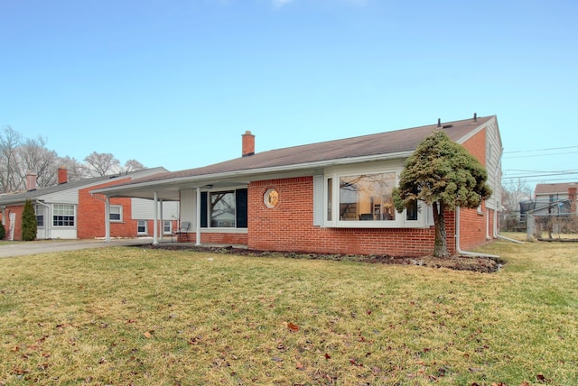 ranch-style home with a front yard