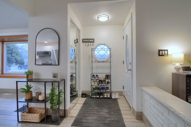 entrance foyer featuring light hardwood / wood-style floors