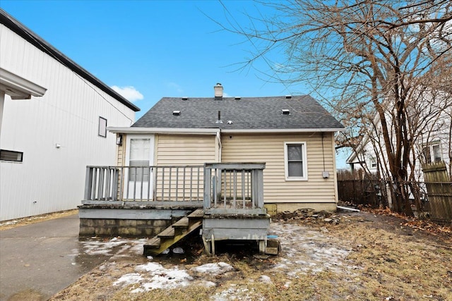 rear view of property with a deck