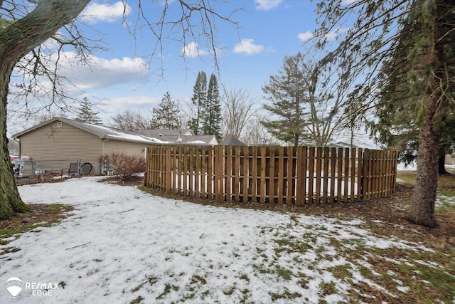 view of yard covered in snow