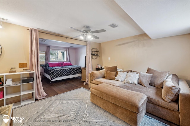 bedroom featuring hardwood / wood-style floors and ceiling fan