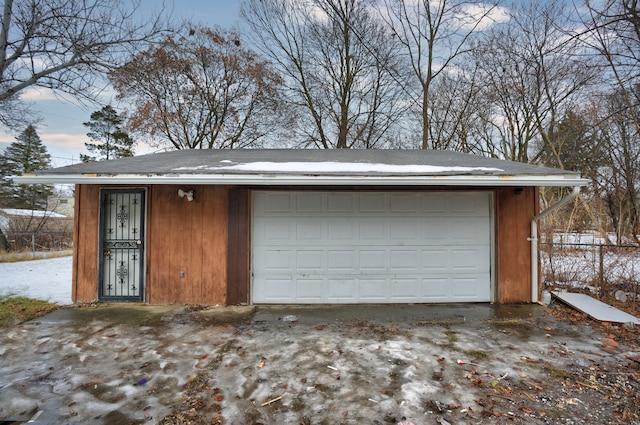 view of snow covered garage