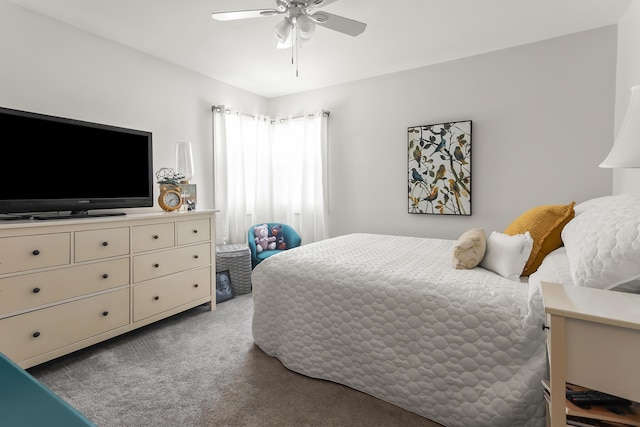 bedroom with ceiling fan and light colored carpet