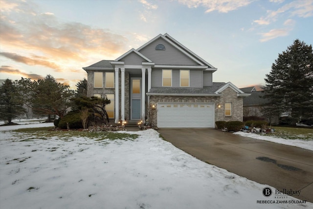 view of front of property featuring a garage