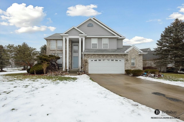 front of property with a garage