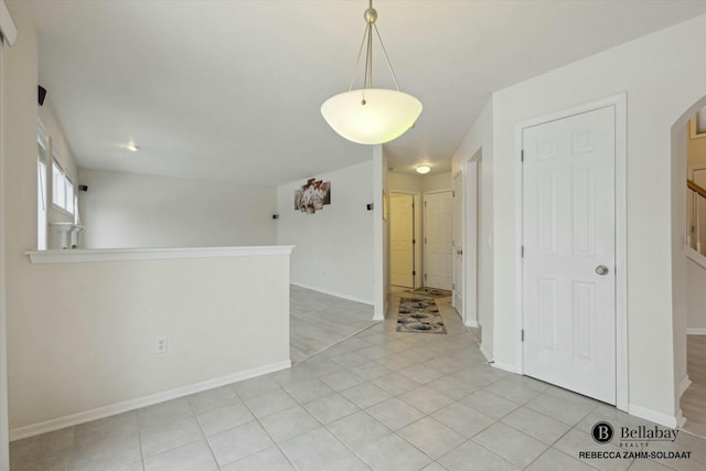 spare room with light tile patterned floors