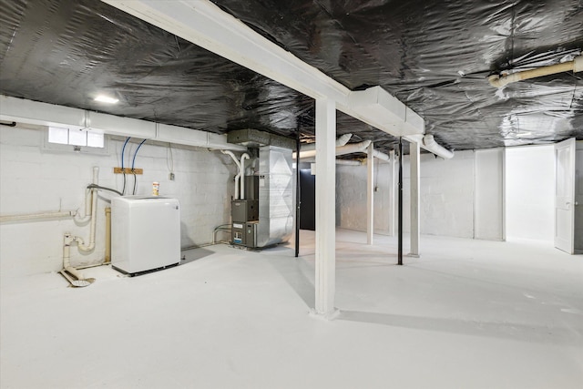 basement featuring heating unit