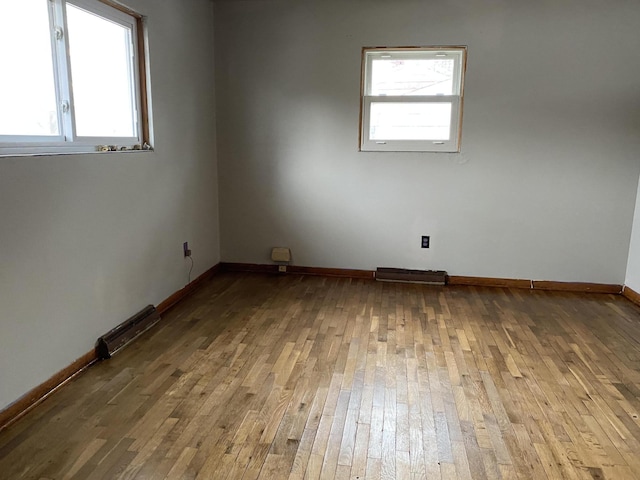 empty room with light wood-type flooring