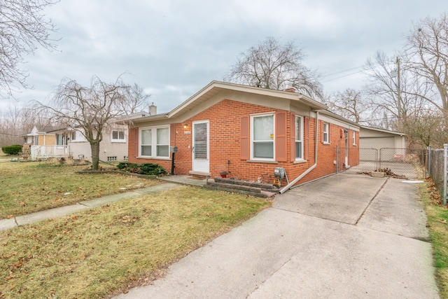 view of front of home with a garage and a front yard