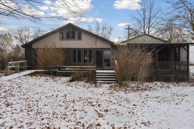 view of snow covered property