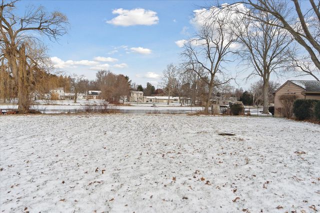 view of yard covered in snow