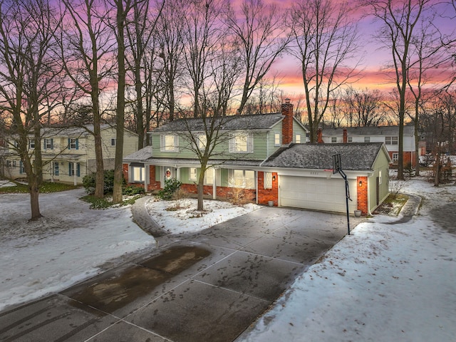 view of front of home with a garage