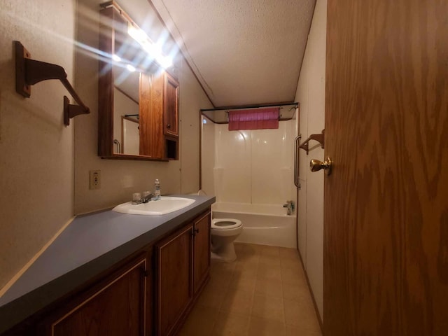 full bathroom with tile patterned floors, toilet, a textured ceiling, shower / washtub combination, and vanity