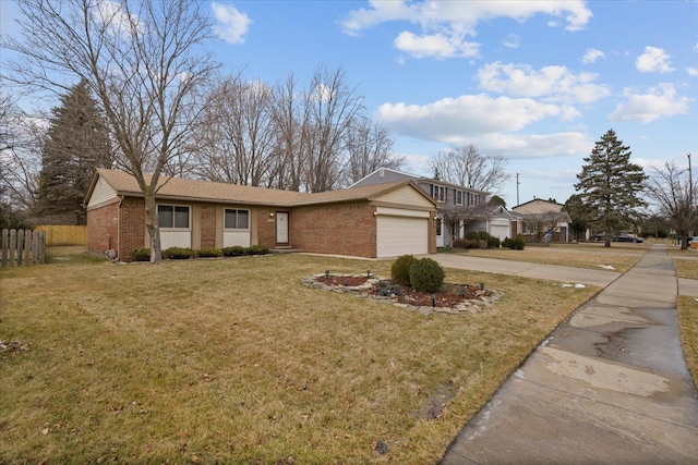 ranch-style home with a garage and a front yard