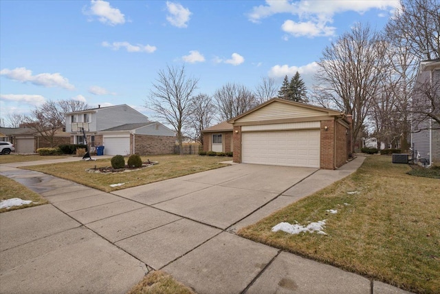 view of front facade featuring a garage and a front lawn