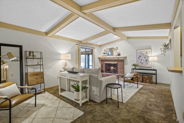 carpeted living room featuring a fireplace, lofted ceiling with beams, and a textured ceiling