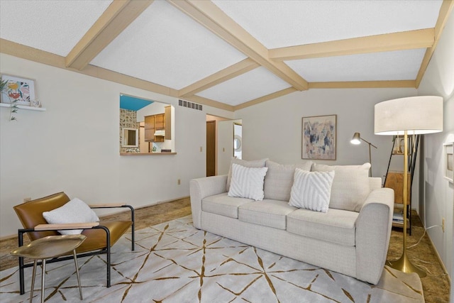 living room with lofted ceiling with beams