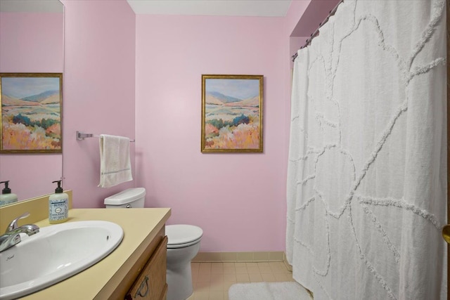 bathroom with walk in shower, vanity, toilet, and tile patterned flooring