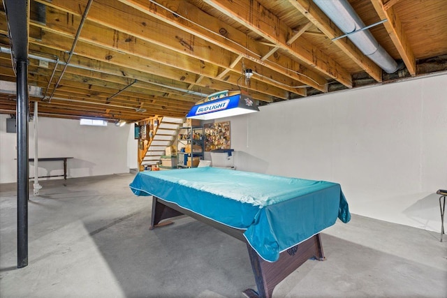 recreation room with pool table and concrete flooring