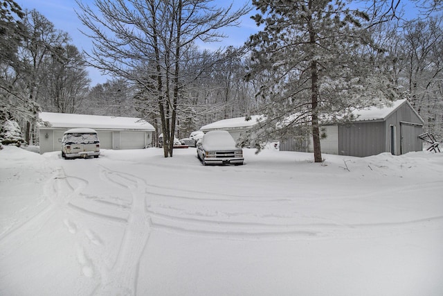 view of yard layered in snow