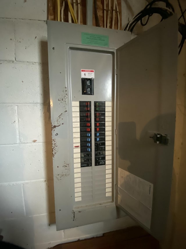 utility room featuring electric panel