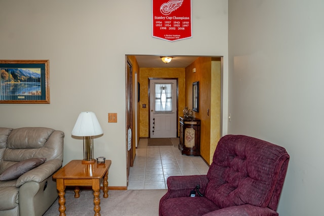 interior space featuring light carpet