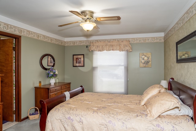 bedroom with ceiling fan and carpet flooring