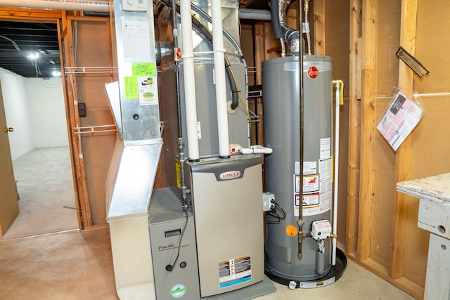 utility room with heating unit and gas water heater