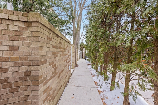 view of property exterior featuring brick siding