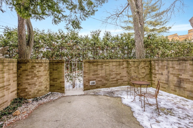 view of snow covered patio